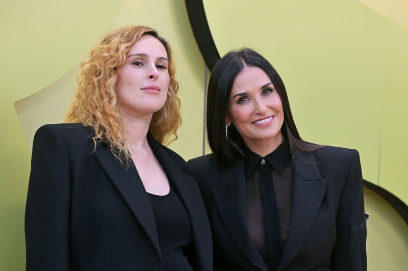 Rumer Willis (L), seen with mother Demi Moore, will perform on the season premiere of "The Masked Singer." File Photo by Chris Chew/UPI