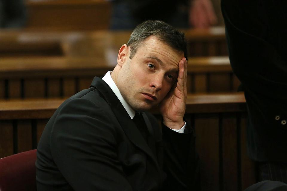 Pistorius claimed he thought an intruder was in the bathroom when he fired four shots through the door, killing Ms Steenkamp (AP)