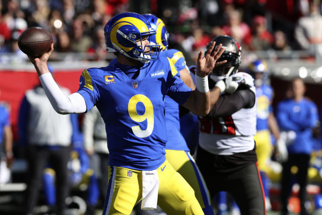 Los Angeles Rams quarterback Matthew Stafford (9) throws a pass against the Tampa Bay Buccaneers during the first half of an NFL divisional round playoff football game Sunday, Jan. 23, 2022, in Tampa, Fla. (AP Photo/Mark LoMoglio)