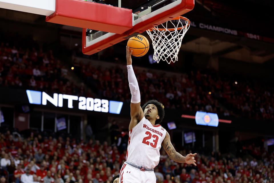 Chucky Hepburn #23 of the Wisconsin Badgers scores on a lay up during the second half of the game against the Liberty Flames in the second round of the NIT Men’s Basketball Tournament at Kohl Center on March 19, 2023 in Madison, Wisconsin. John Fisher/Getty Images