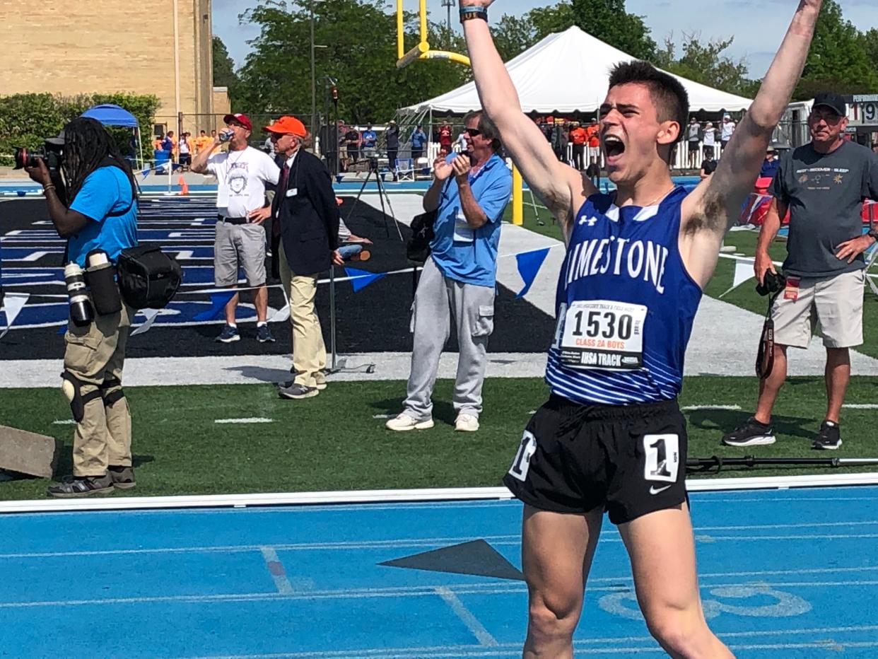 Limestone senior Wilson Georges celebrates after setting the Class 2A state record in winning the 1600-meter run Saturday during the Illinois High School Association boys track and field state finals in Charleston.