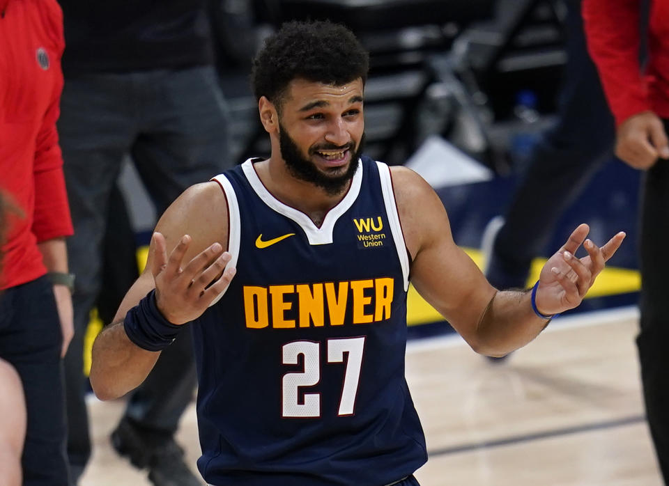 Jamal Murray reacts after the Nuggets' loss to the Wizards. (Jack Dempsey/AP)