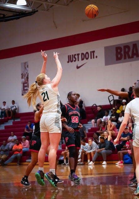 Taylor Orris scored her 1,000 points playing for Lemon Bay and Venice High.