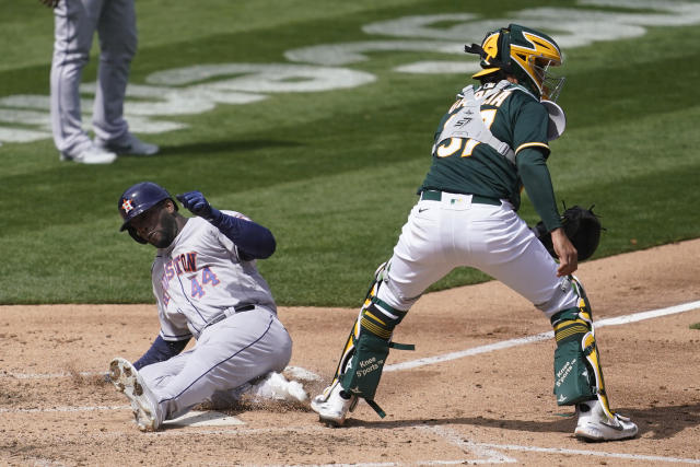 Astros batter A's 9-2 to complete four-game sweep