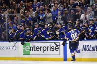 Apr 1, 2019; St. Louis, MO, USA; St. Louis Blues center Ryan O'Reilly (90) is congratulated by teammates after scoring during shootouts against the Colorado Avalanche at Enterprise Center. Mandatory Credit: Jeff Curry-USA TODAY Sports