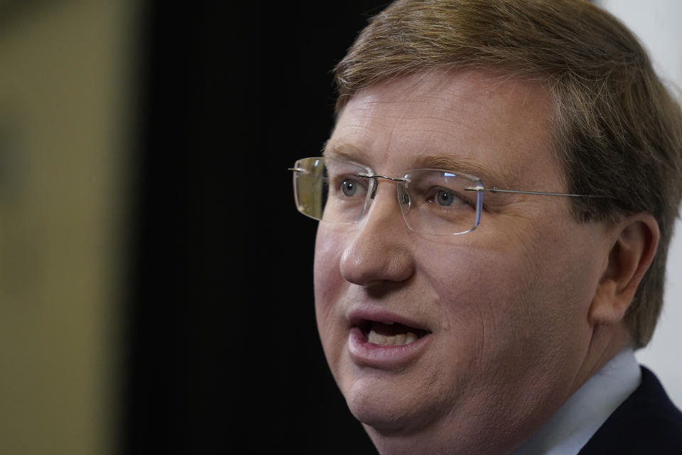 Mississippi Gov. Tate Reeves speaks with reporters following the televised gubernatorial debate with the Democratic challenger Brandon Presley, Wednesday, Nov. 1, 2023, in Jackson, Miss. (AP Photo/Rogelio V. Solis)