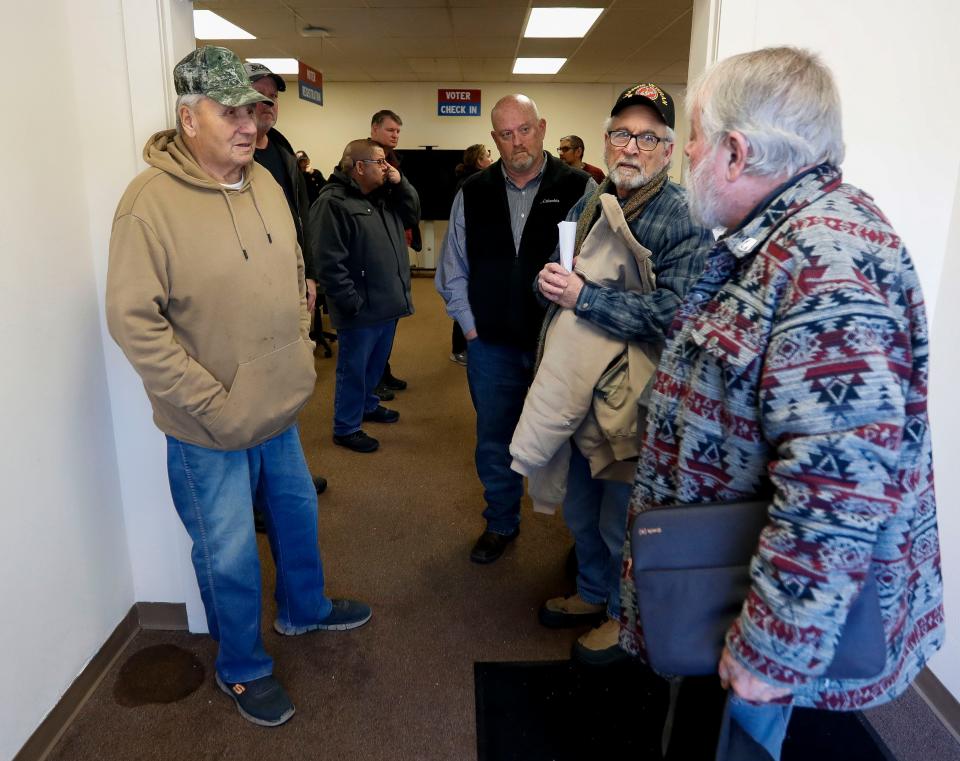 Former Lac du Flambeau Tribe president Tom Maulson (left) talks with Lac du Flambeau Supervisor Bob Hanson after a town board meeting on Wednesday, February 8, 2023, at Lac du Flambeau town hall in Lac du Flambeau, Wis. A special town board meeting was held to receive public comment and deliberate over the town’s course of action in response to Lac du Flambeau reservation tribal officials erecting barricades along four roads in the area. Tribal officials set up barricades on the roads Jan. 30 after negotiations with property title companies that built the roads and the homes they access broke down. Tribal officials say the roads were illegally built on tribal lands and the tribe was not compensated for the right-of-way easements.Tork Mason/USA TODAY NETWORK-Wisconsin 