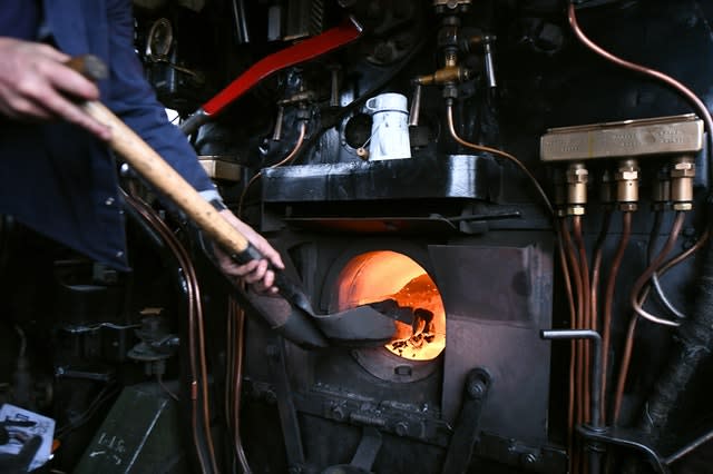 Coal in a steam locomotive (Joe Giddens/PA)