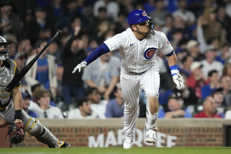 Chicago Cubs' Seiya Suzuki watches his two-run double off Pittsburgh Pirates relief pitcher Colin Holderman during the eighth inning of a baseball game Wednesday, June 14, 2023, in Chicago. (AP Photo/Charles Rex Arbogast)