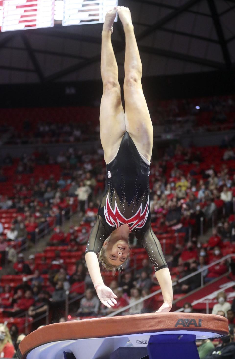 Utah’s Lucy Stanhope competes on the vault as the Utah Red Rocks compete against Oregon State in a gymnastics meet at the Huntsman Center in Salt Lake City on Friday, Feb. 18, 2022. Utah won. | Kristin Murphy, Deseret News