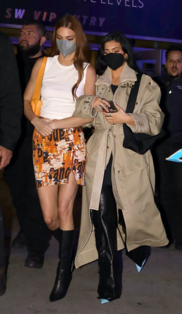 Kylie and Kendall leaving the Suns vs. Clippers game on April 6. - Credit: Damian Avitia /London Entertainment / SplashNews.com