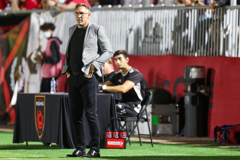 Phoenix Rising FC head coach Rick Schantz watches his team during the first half against New Mexico United on Wednesday, April 20, 2022, in Chandler. Rising beat the United 2-1 with a late goal by Phoenix Rising FC forward Greg Hurst (17).