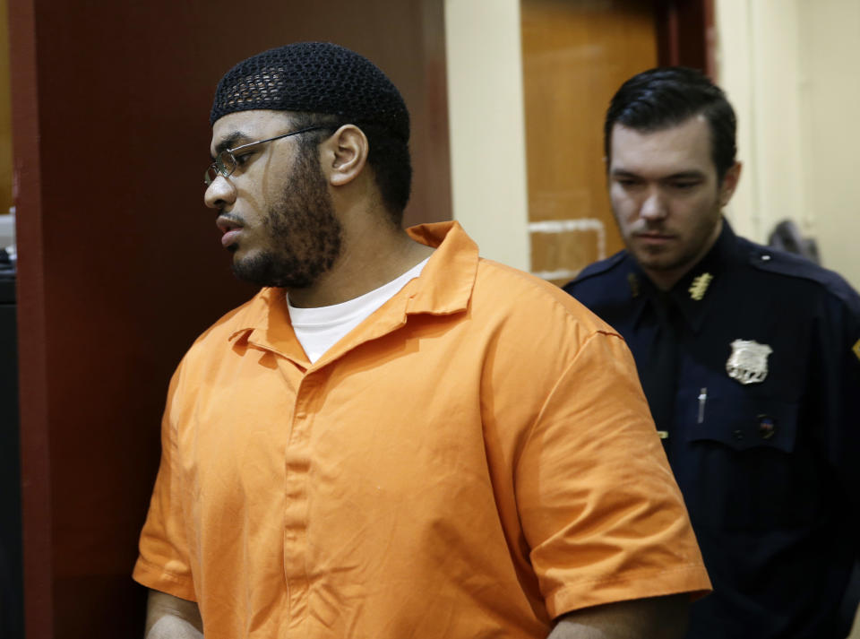 Jose Pimentel enters the courtroom in New York, Wednesday, Feb. 19, 2014. Pimentel, accused of building homemade bombs to wage holy war in New York City, pleaded guilty Wednesday to a terrorism charge less than a week before his scheduled trial in a rare state-level terrorism case. With the plea, Pimentel, 29, was promised a sentence of 16 years in prison. He would have faced a minimum of 15 years to life if convicted of the top charge, a high-level weapons possession offense as a terrorism crime. (AP Photo/Seth Wenig, Pool)