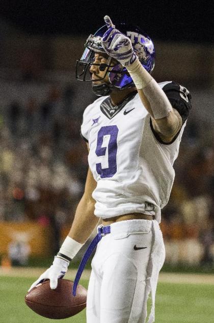 TCU&#39;s Josh Doctson (9) celebrates a catch during the first half of an NCAA college football game against Texas, Thursday, Nov. 27, 2014, in Austin, Texas. (AP Photo/Ashley Landis)