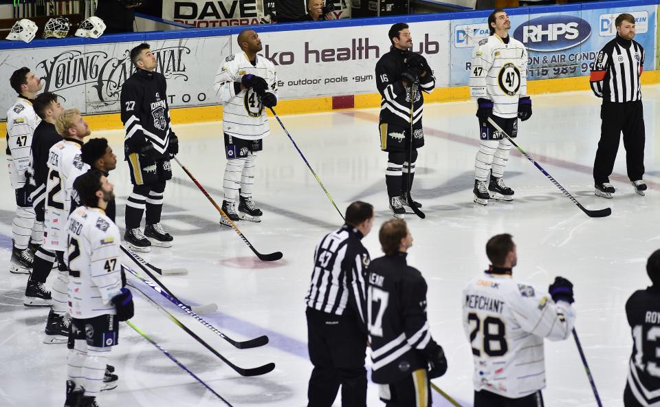 Players pay tribute before the Adam Johnson memorial game between the Nottingham Panthers and Manchester Storm.