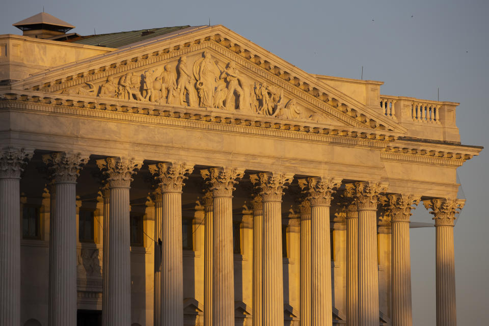 The Senate side of the U.S. Capitol at sunrise on Monday, Jan. 20, 2020, in Washington. The impeachment trial of President Donald Trump will resume in the U.S. Senate on Tuesday. (AP Photo/Jon Elswick)