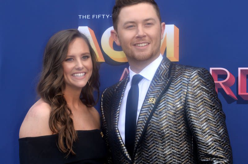 Gabi Dugal (L) and singer Scotty McCreery attend the 53rd annual Academy of Country Music Awards held at MGM Grand Garden Arena in Las Vegas in 2018. File Photo by Jim Ruymen/UPI