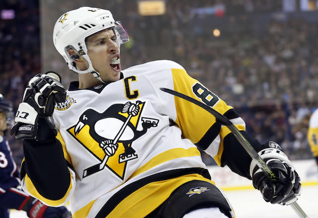 Pittsburgh Penguins' Sidney Crosby celebrates his goal against the Columbus Blue Jackets during the first period of an NHL hockey game Thursday, Dec. 22, 2016, in Columbus, Ohio. (AP Photo/Jay LaPrete)