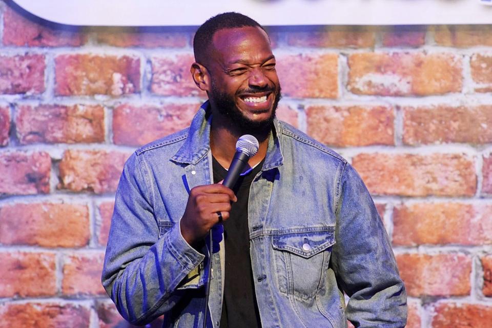 <p>Marlon Wayans takes the mic at The Stress Factory Comedy Club on Thursday in New Brunswick, New Jersey.</p>