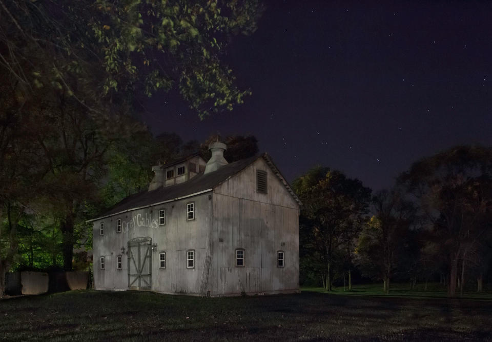 <p>Joshua Eliason Jr. barnyards and farmhouse, an Underground Railroad station, with a tunnel leading underneath the road to another station, Centerville, Indiana. (Photograph by Jeanine Michna-Bales) </p>