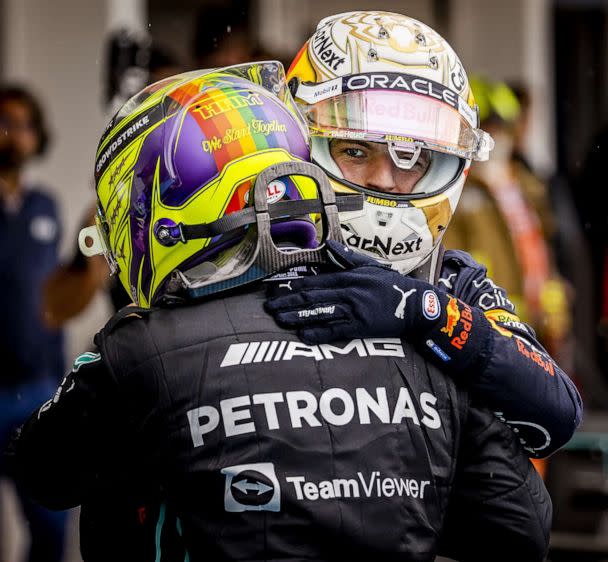 PHOTO: Max Verstappen hugs Lewis Hamilton after the Hungarian Grand Prix at the Hungaroring Circuit on July 31, 2022 in Budapest, Hungary. (Remko De Waal/ANP via Getty Images)