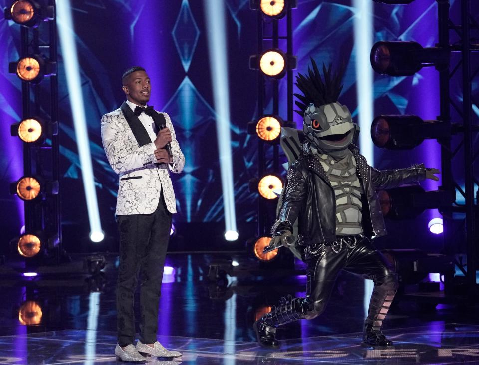 "Masked Singer" host Nick Canon with Turtle.