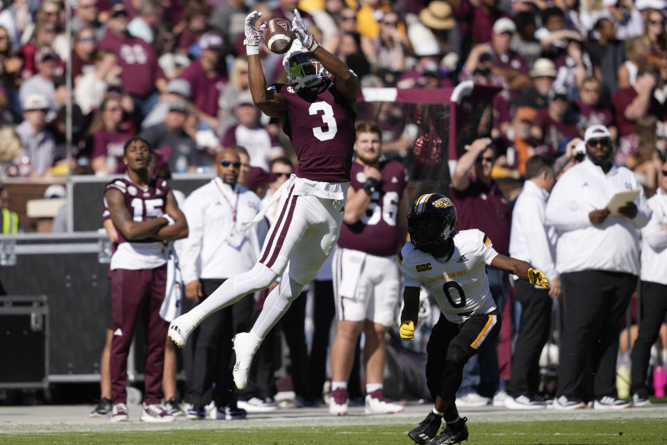 Mississippi State wide receiver Justin Robinson (3) cannot hold on to a pass while Southern Mississippi cornerback Brendan Toles (0) defends during the first half of an NCAA college football game in Starkville, Miss., Saturday, Nov. 18, 2023. (AP Photo/Rogelio V. Solis)