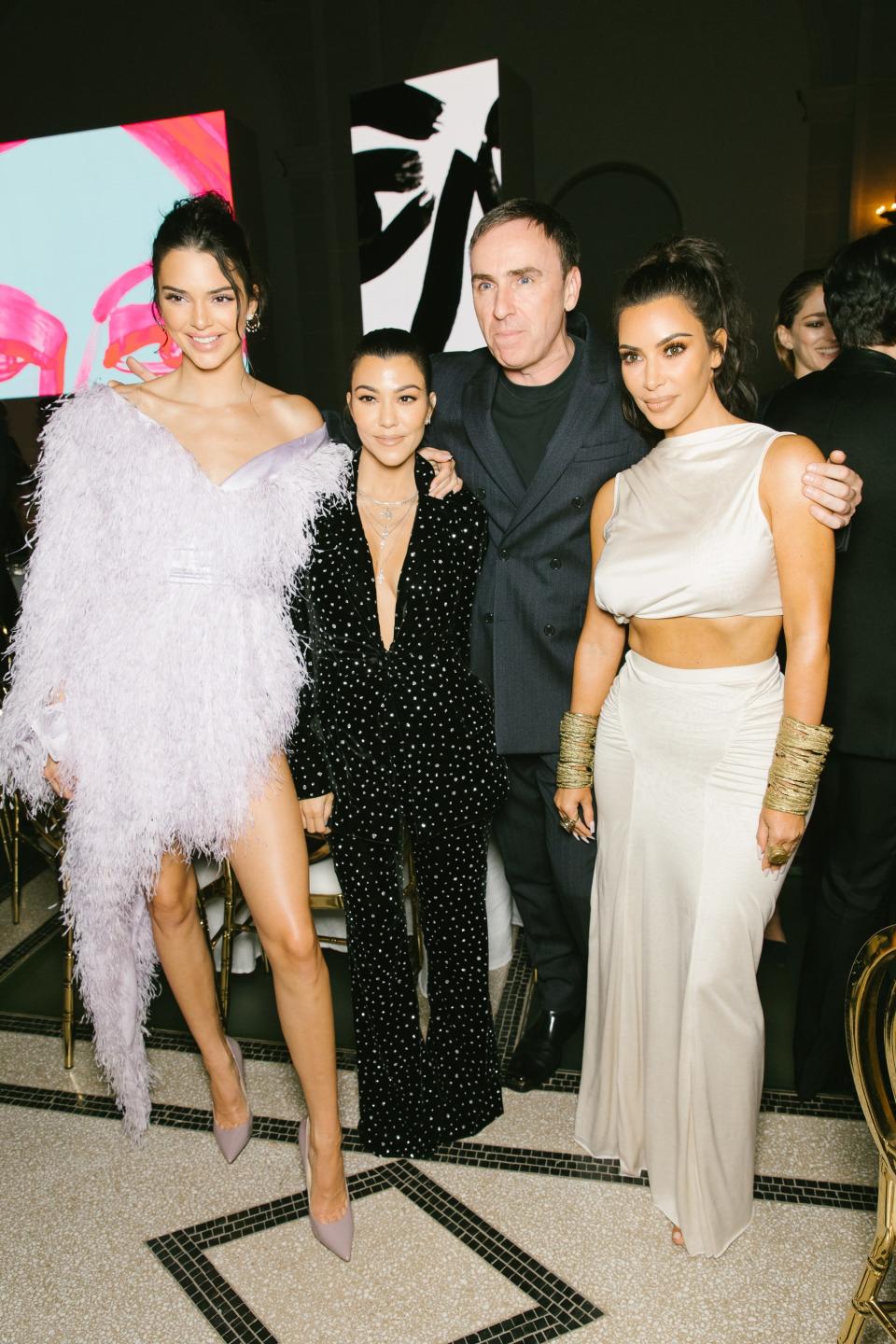 Kendall Jenner, Kourtney Kardashian, Raf Simons, and Kim Kardashian West