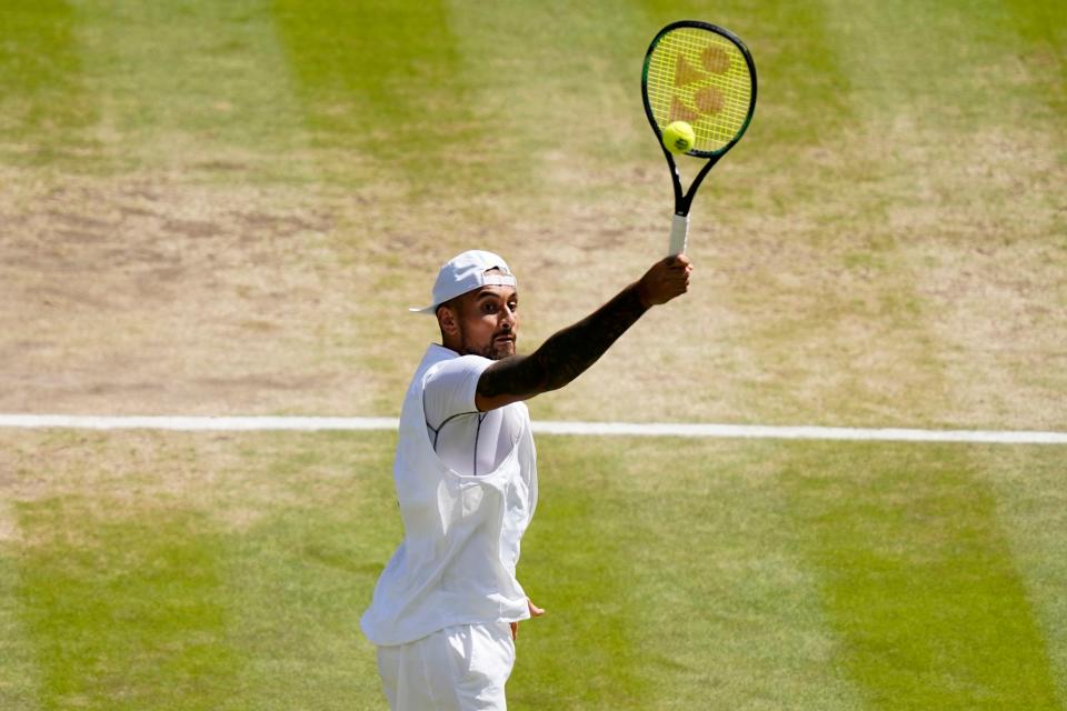 Australia's Nick Kyrgios returns to Serbia's Novak Djokovic (AP)