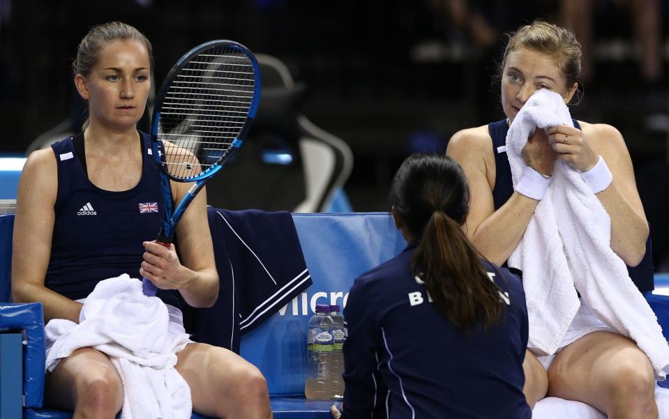 Olivia Nicholls (L) and Alicia Barnett (R) of Britain react during their doubles match against Storm Sanders and Samantha Stosur of Australia at the Billie Jean King Cup Finals - Great Britain's Billie Jean Cup run comes to an end as Australia edge to the final - Shutterstock/Adam Vaughan