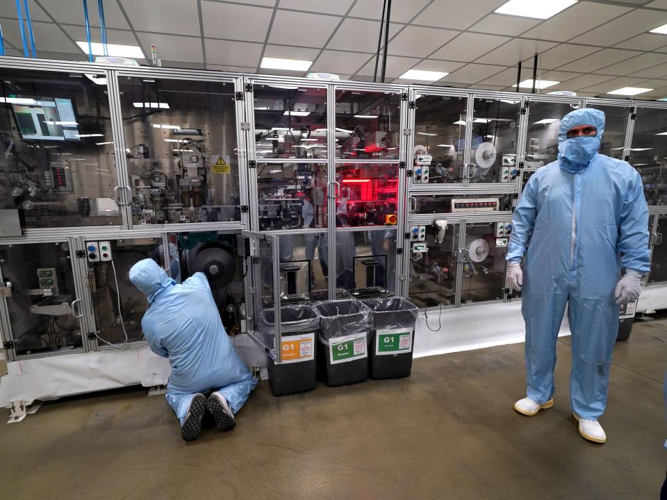 Nissan workers at a battery plant in Sunderland (PA)