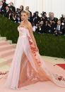 <p>Despite being heavily pregnant, Blake Lively pulled off this baby pink silk Burberry gown to perfection at the 2016 MET Gala.</p>