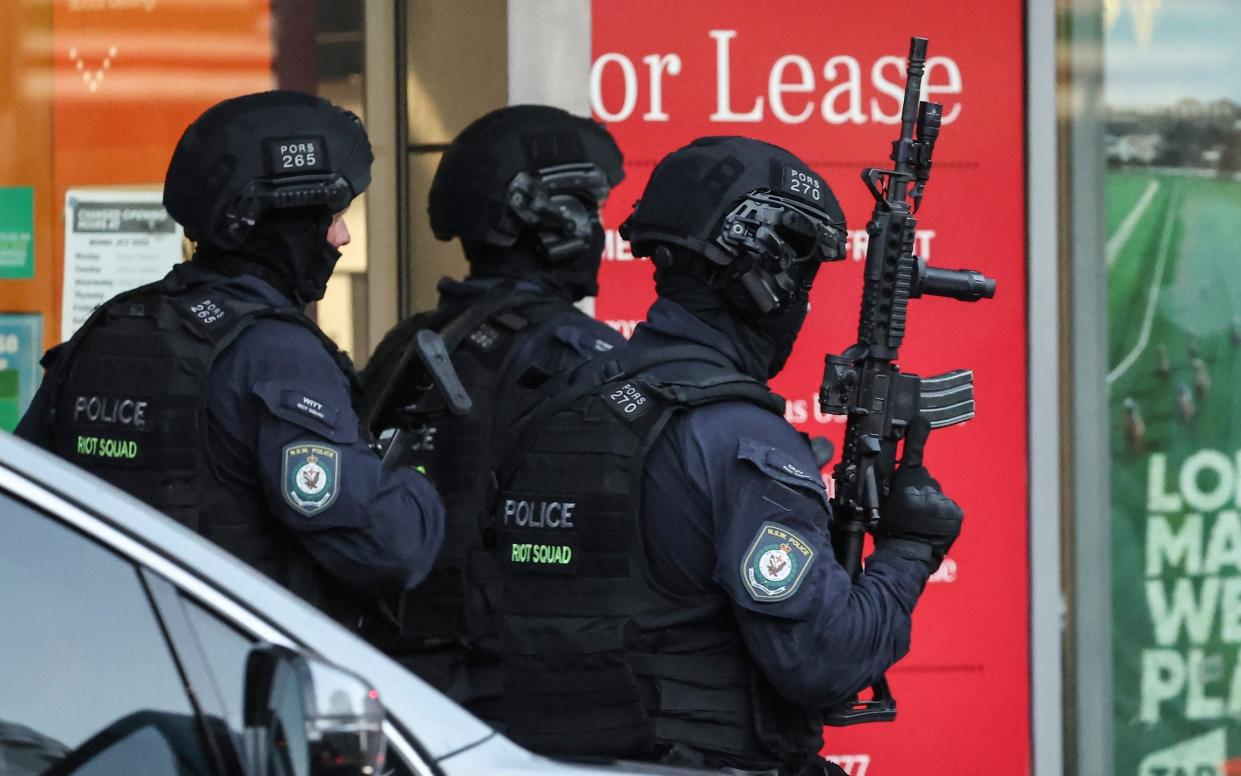 Police enter the Westfield Bondi Junction shopping mall