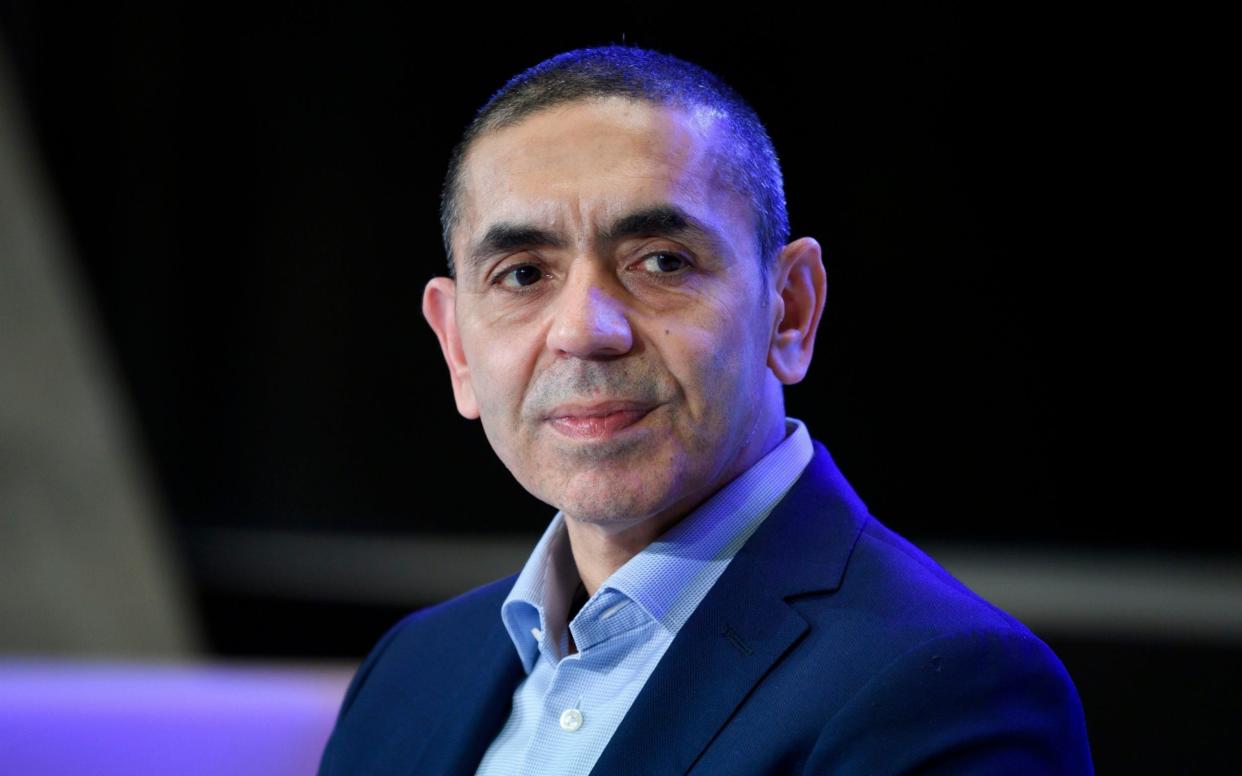 In this Thursday, March 18, 2021 file photo, Ugur Sahin, co-founder of the Mainz-based coronavirus vaccine developer BioNTech, listens during an award ceremony - Bernd von Jutrczenka/dpa via AP