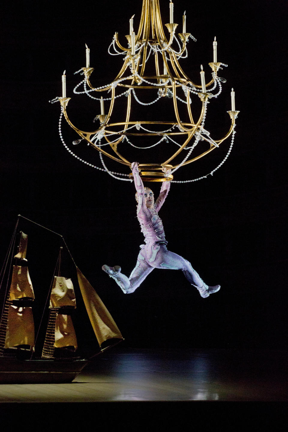 In this Oct. 15, 2012 photo provided by the Metropolitan Opera, acrobat Jaime Verazin performs as Ariel during a dress rehearsal of Thomas Adès's "The Tempest," at the Metropolitan Opera in New York. (AP Photo/Metropolitan Opera, Ken Howard)