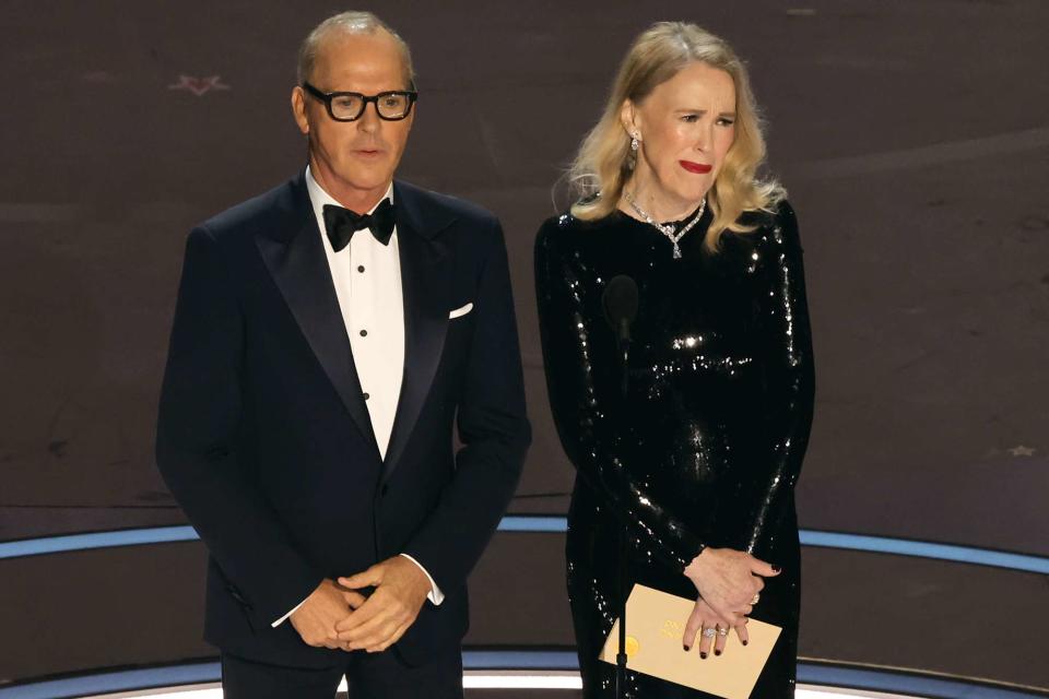 <p>Kevin Winter/Getty</p> Michael Keaton and Catherine O