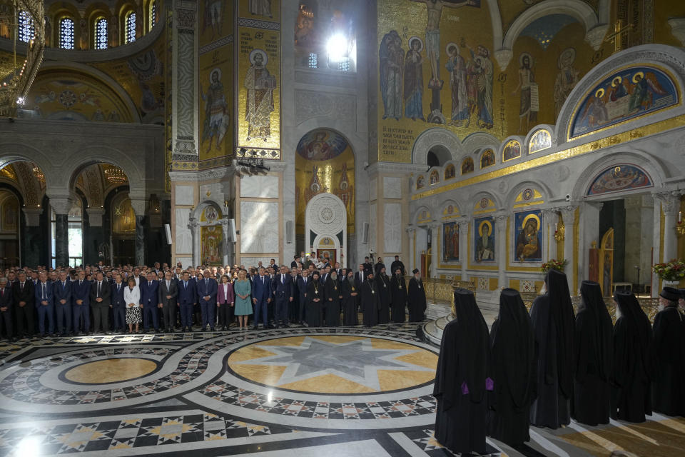 Officials from Serbia, Bosnian Serb and Montenegro political leaders attend the prayer service for the All-Serbian Assembly in the St. Sava Serbian Orthodox temple in Belgrade, Serbia, Saturday, June 8, 2024. The All-Serbian Assembly carries the main message that Serbs, wherever they live, are one people, that they strive for the same goals. (AP Photo/Darko Vojinovic)