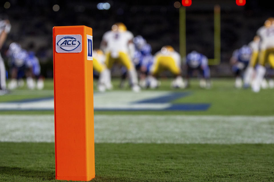 FILE - The ACC and Duke logos seen on a pylon at the back of an end zone during an NCAA college football game between Duke and Pittsburgh in Durham, N.C., Saturday, Oct. 5, 2019. The Atlantic Coast Conference has cleared the way for Stanford, California and SMU to join the league, two people with direct knowledge of the decision told The Associated Press on Friday, Sept. 1, 2023, providing a landing spot for two more teams from the disintegrating Pac-12. (AP Photo/Ben McKeown, File)