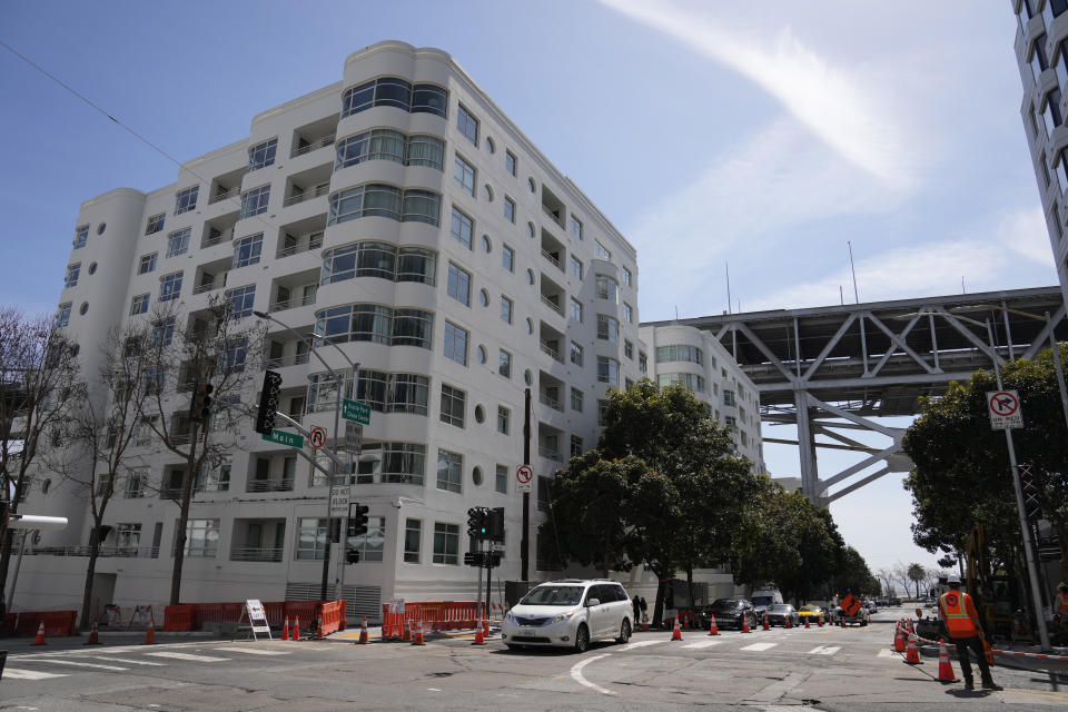 Shown is the scene outside an apartment building below the San Francisco-Oakland Bay Bridge where a technology executive was fatally stabbed in San Francisco, Wednesday, April 5, 2023. Bob Lee, a technology executive who created Cash App and was currently chief product officer of MobileCoin, was fatally stabbed in San Francisco early Tuesday, April 4, 2023, according to the cryptocurrency platform and police. (AP Photo/Eric Risberg)