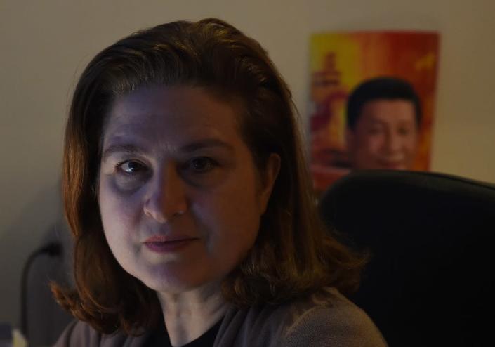 Beijing refused to renew the credentials of Ursula Gauthier, the China correspondent for France's L'Obs news magazine, after she wrote an article questioning Beijing's policy in Xinjiang (AFP Photo/Greg Baker)