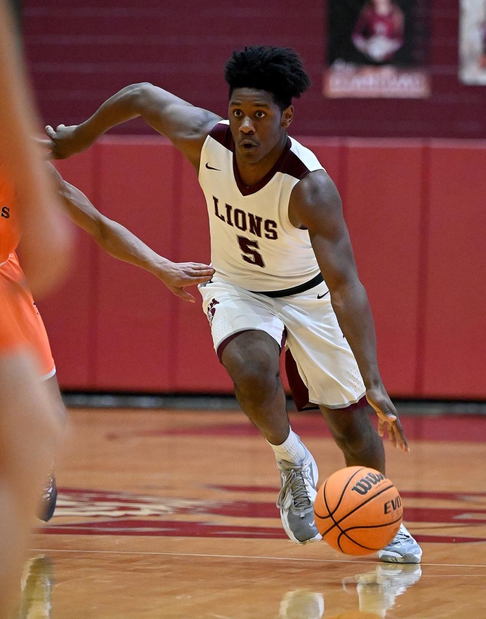 First Baptist Latrell Davis (5) pushes the ball during their game against Bradenton Christian in Naples for a finals matchup where the winner will go the division final four playoffs Friday, Feb. 25, 2022.(Photo/Chris Tilley)