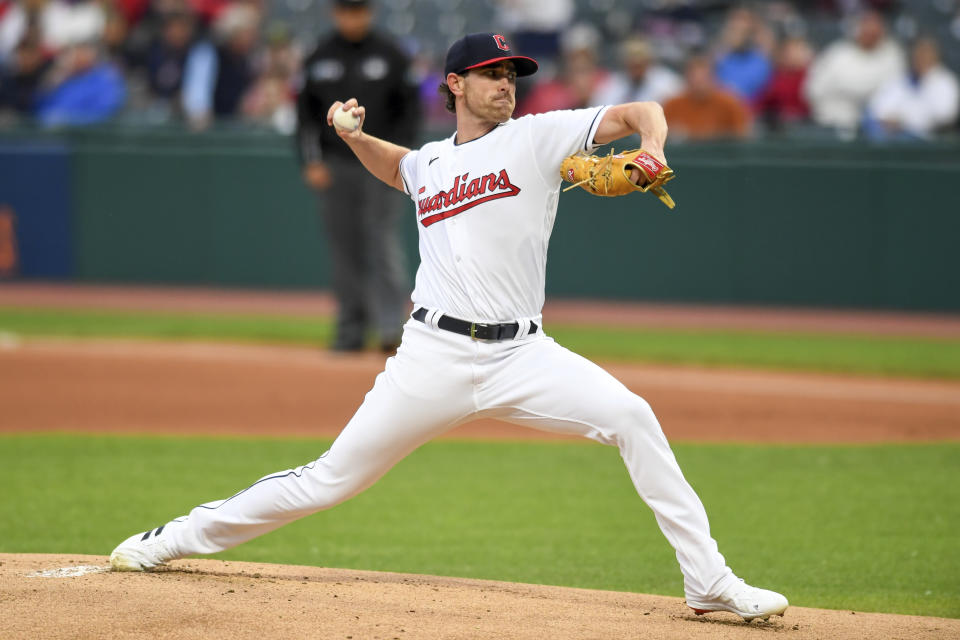 Cleveland Guardians starting pitcher Shane Bieber throws to a Texas Rangers batter during the first inning of a baseball game Wednesday, June 8, 2022, in Cleveland. (AP Photo/Nick Cammett)