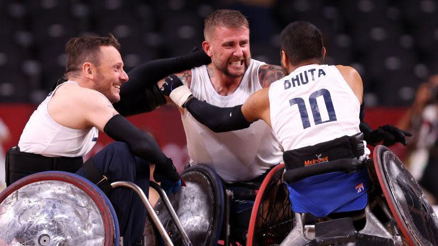 Ryan Cowling, Stuart Robinson and Ayaz Bhuta celebrate gold