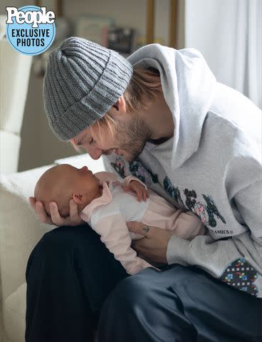 <p>Hannah Cree Photography</p> Michael Clifford and daughter Lua