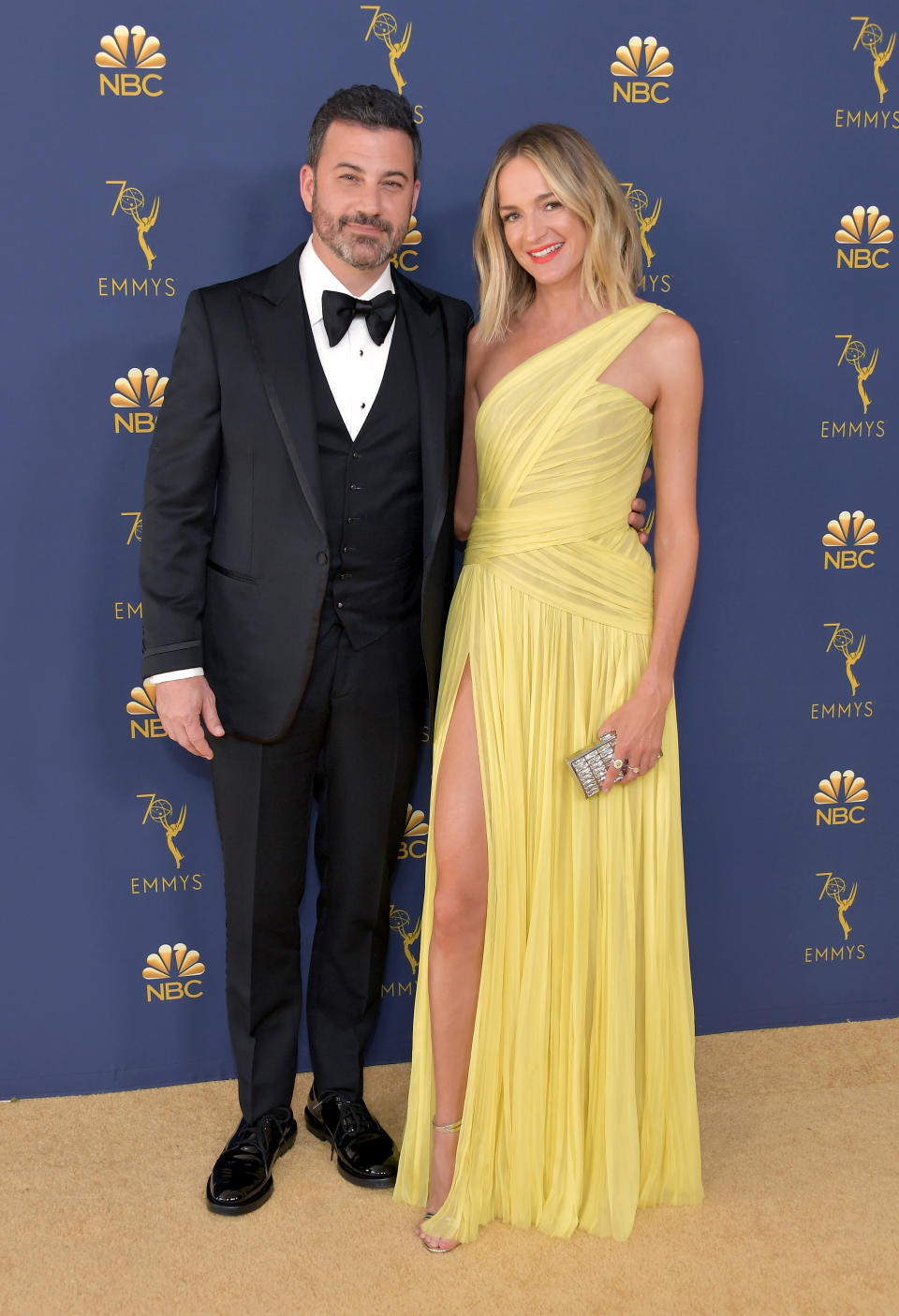 <p>McNearney paired her yellow dress with the perfect orange-red lip. (Photo: Getty Images) </p>