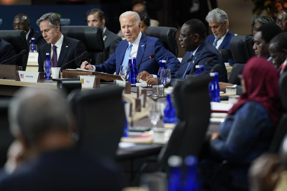 Secretary of State Antony Blinken and President Joe Biden listen as Senegal's President Macky Sall speaks during the U.S.-Africa Summit Leaders Session on partnering on the African Union's Agenda 2063, Thursday, Dec. 15, 2022, in Washington. (AP Photo/Patrick Semansky)