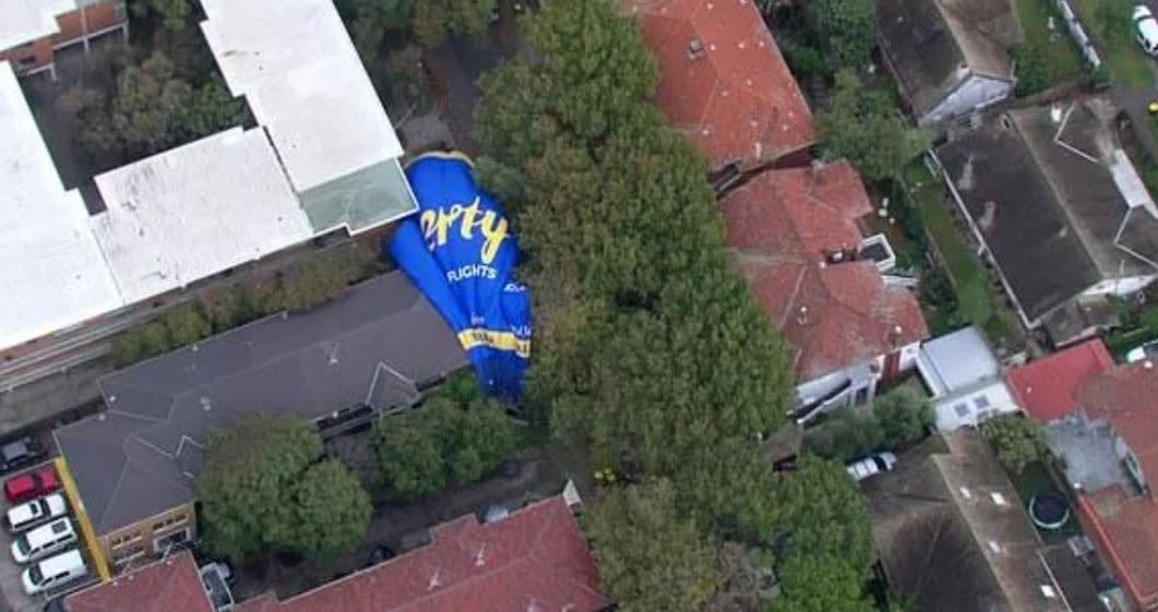 Hot air balloon seen from above in Melbourne yard.