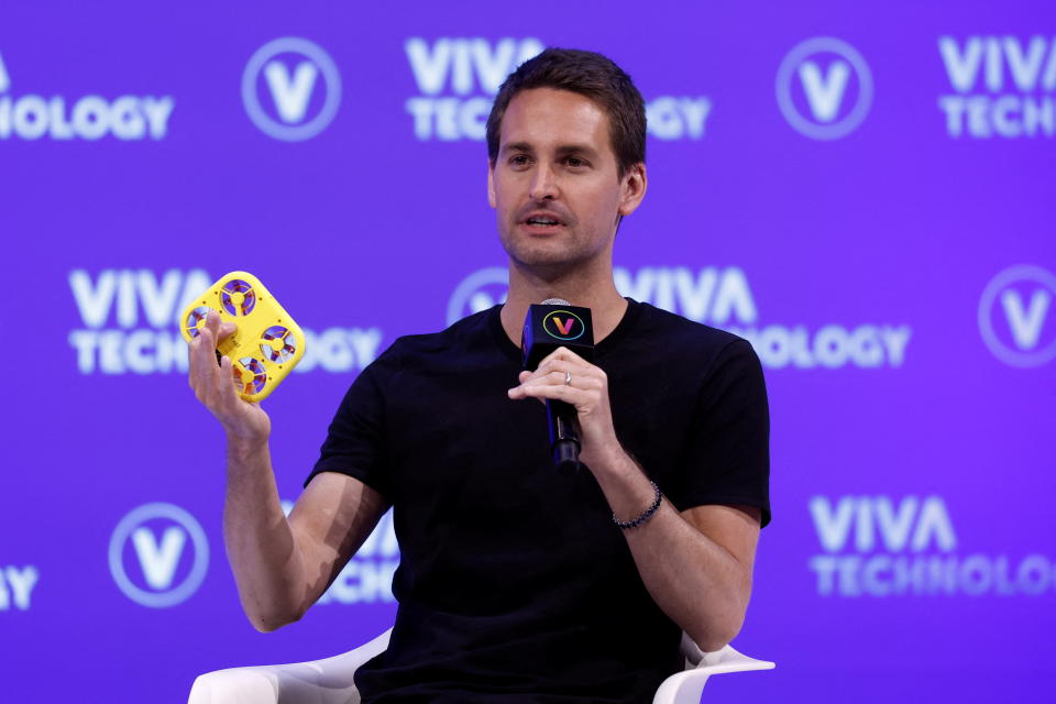 Co-founder and CEO of Snap Inc. Evan Spiegel holds up a Pixy drone while speaking during the Viva Technology conference dedicated to innovation and startups, at the Porte de Versailles exhibition center in Paris, France June 17, 2022. REUTERS/Benoit Tessier