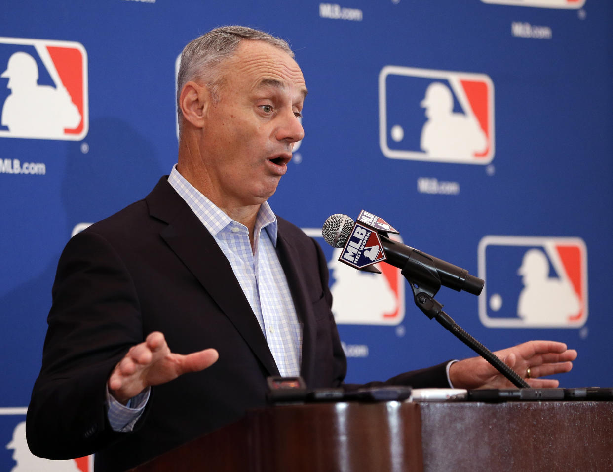 Rob Manfred talks pace-of-play changes and other things at the quarterly MLB owners meetings. (AP Photo)