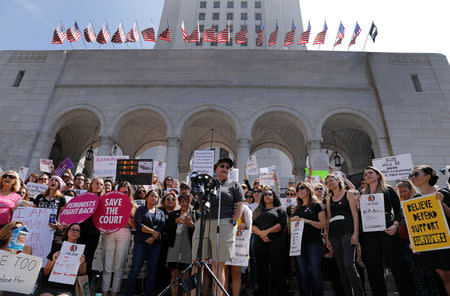 Demonstrators gather outside Los Angeles City Hall to protest the Senate Judiciary committee's vote on President Trump's U.S. Supreme Court pick Brett Kavanaugh, in Los Angeles, California, U.S., September 28, 2018. REUTERS/Mike Blake